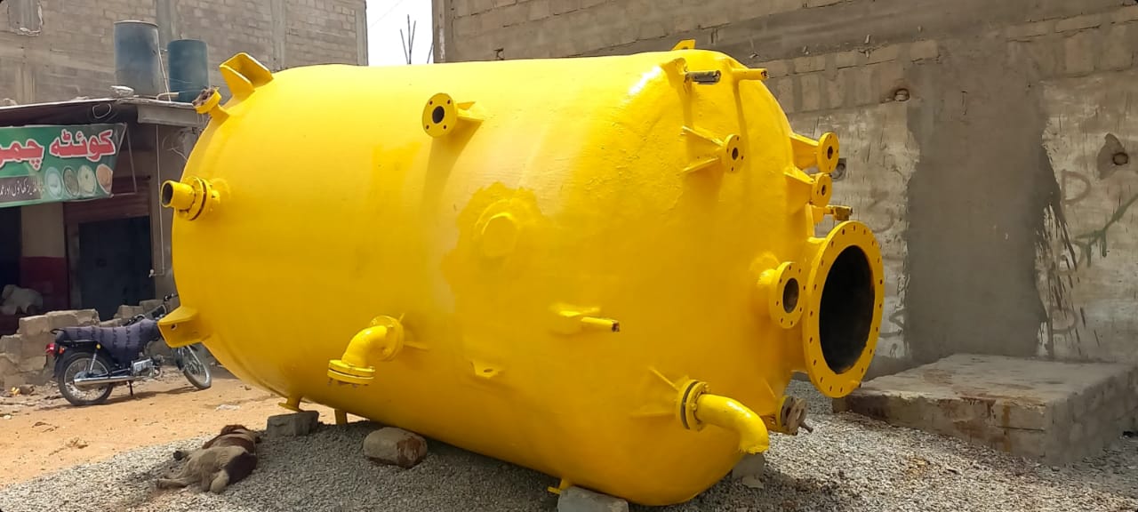 Completed yellow fiber-lined industrial vessel