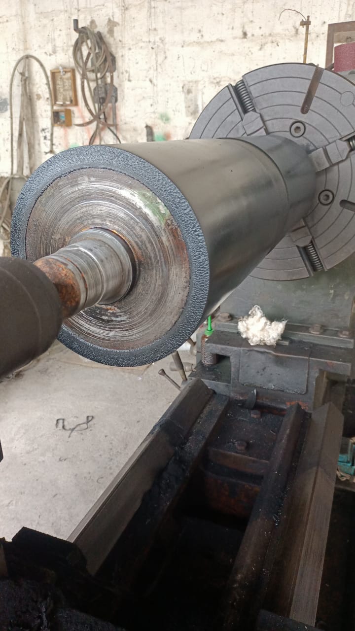 Industrial roller receiving a precision rubber lining