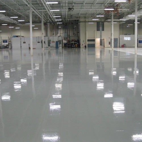 Large warehouse with a seamless grey industrial epoxy floor