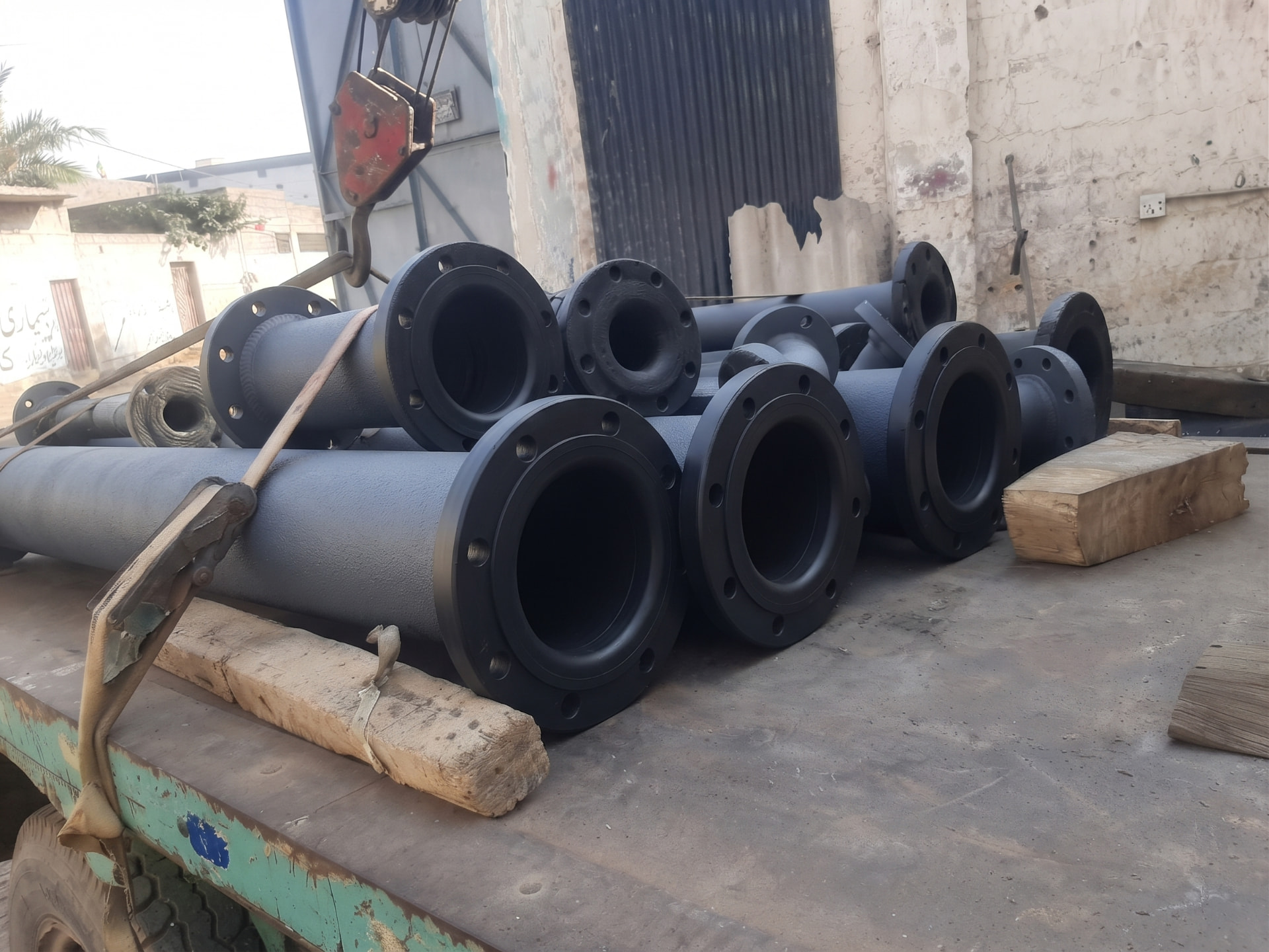 Industrial pipe spools with rubber-lined flanges prepared for installation